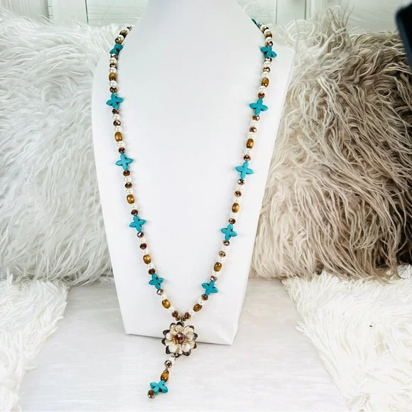 Beautiful weighted bohemian chic long statement necklace